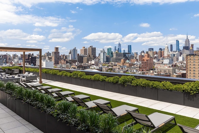 196 Orchard St Unit 7J, New York City, NY 10002 - surrounding community with a skyline view