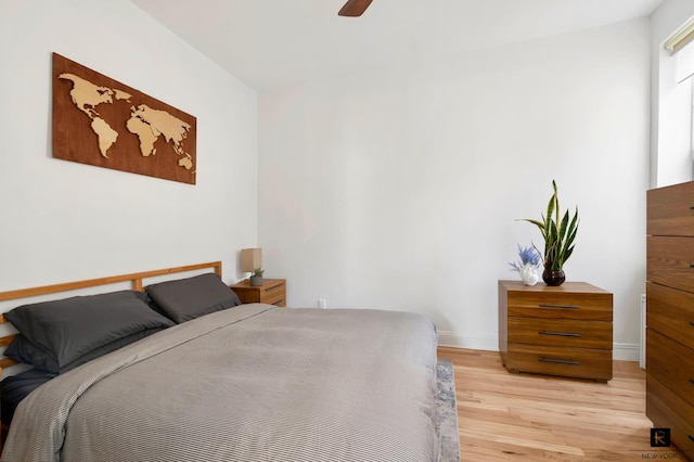 305 W 55th St Unit 4-D, New York City, NY 10019 - bedroom featuring light wood-type flooring, baseboards, and a ceiling fan
