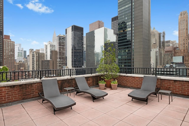 view of patio featuring a skyline view