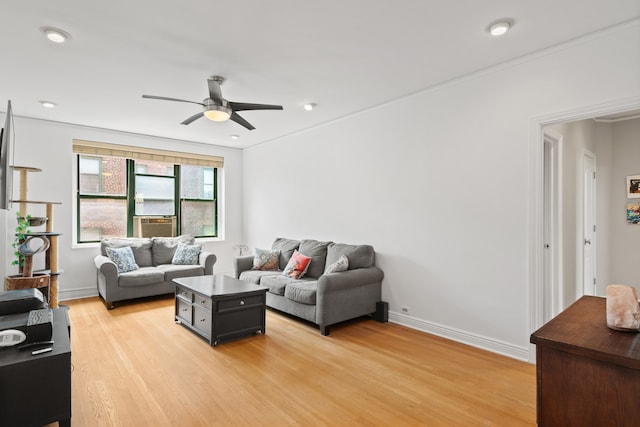 living area featuring light wood finished floors, ceiling fan, cooling unit, recessed lighting, and baseboards