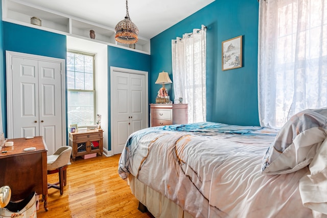 175 E 93rd St Unit 3-B, New York City, NY 10128 - bedroom featuring wood finished floors and multiple closets