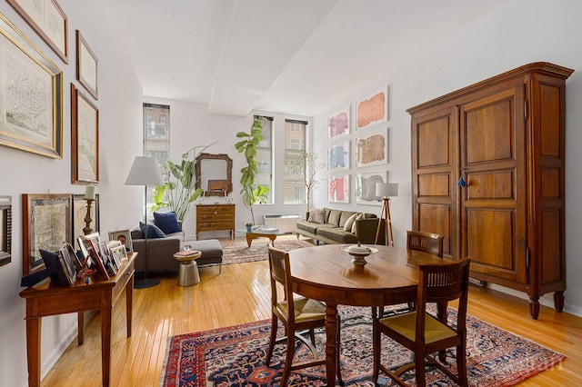 dining room with light wood-type flooring