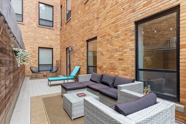 416 W 52nd St Unit 225, New York City, NY 10019 - view of patio with an outdoor living space