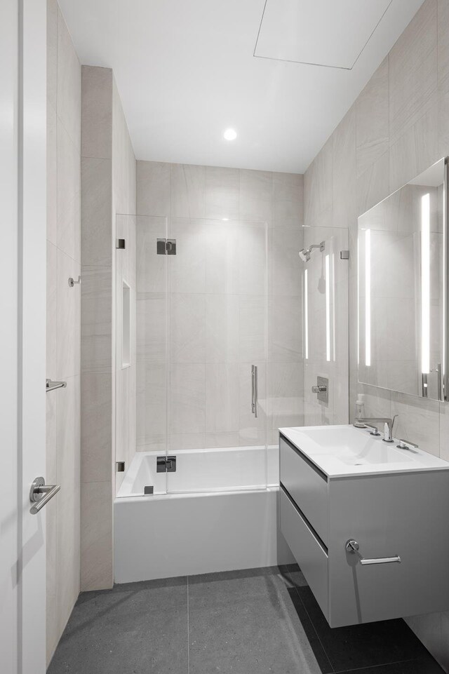 290 W St Unit 2B, New York City, NY 10013 - bathroom featuring shower / tub combination, vanity, and tile patterned flooring