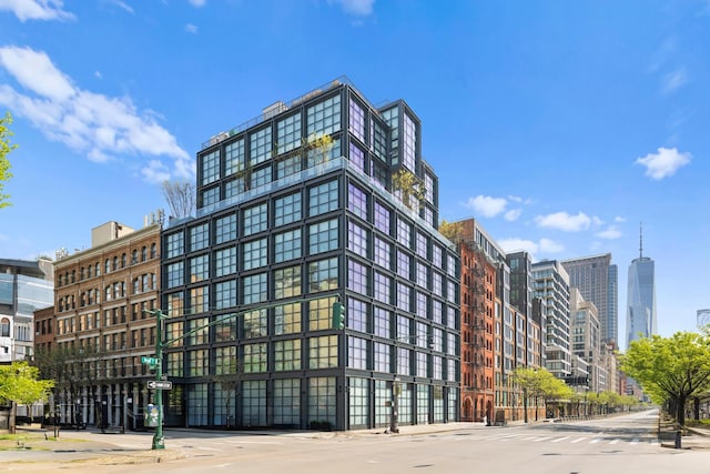 view of building exterior featuring a city view