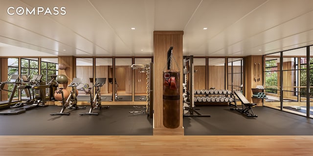 200 E 75th St Unit 11B, New York City, NY 10021 - workout area featuring expansive windows and wood finished floors
