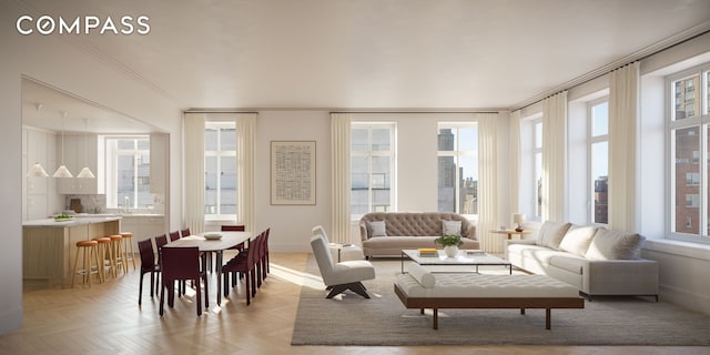 200 E 75th St Unit 11B, New York City, NY 10021 - living room featuring healthy amount of natural light, baseboards, and crown molding