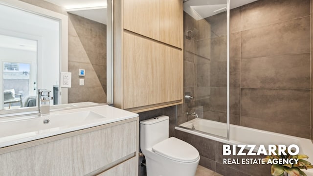 553 W 182nd St Unit 3R, New York City, NY 10033 - bathroom with tiled shower / bath and vanity