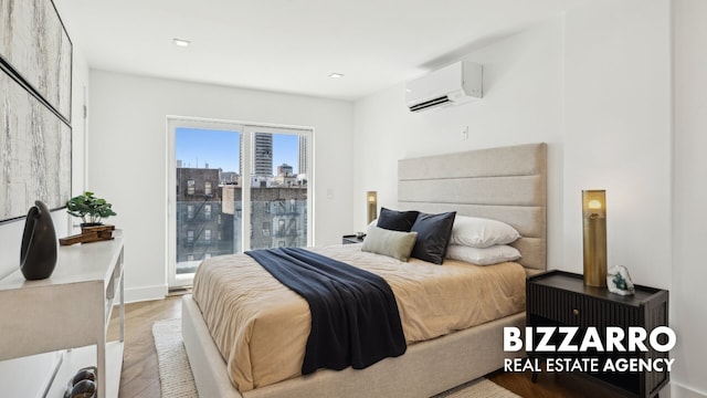 553 W 182nd St Unit 3R, New York City, NY 10033 - bedroom featuring a wall unit AC, access to exterior, light wood-style flooring, and recessed lighting