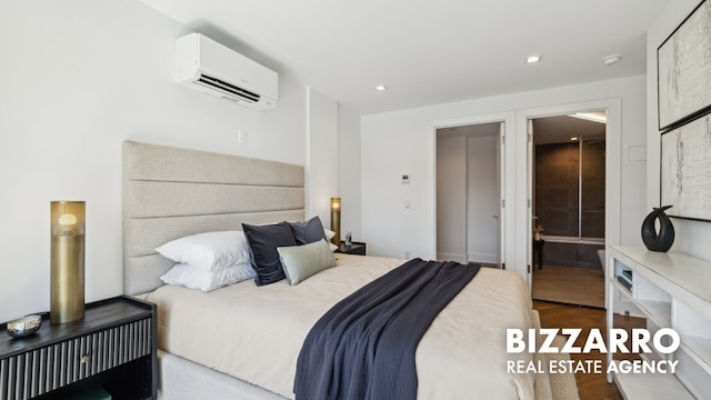 553 W 182nd St Unit 3R, New York City, NY 10033 - bedroom featuring a wall mounted air conditioner, recessed lighting, and ensuite bathroom