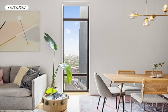 96 Rockwell Pl Unit 11C, New York City, NY 11217 - dining area featuring healthy amount of natural light and a chandelier