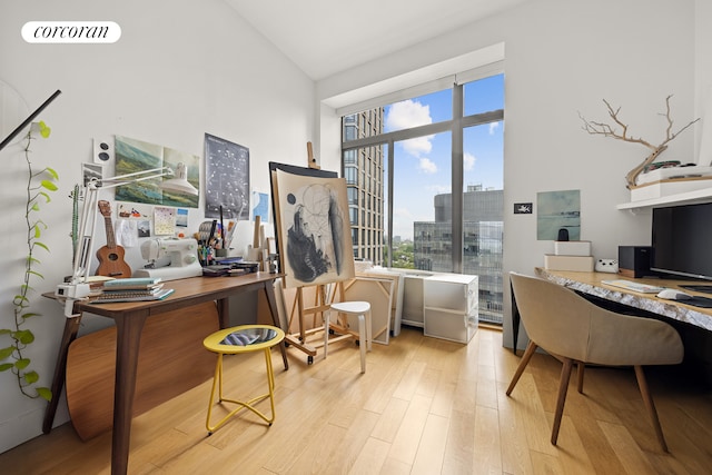 96 Rockwell Pl Unit 11C, New York City, NY 11217 - office space with wood finished floors and high vaulted ceiling