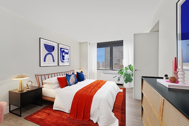 415 E 37th St Unit 31D, New York City, NY 10016 - bedroom featuring wood finished floors