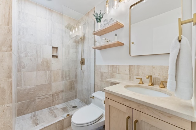 415 E 37th St Unit 31D, New York City, NY 10016 - bathroom with vanity, walk in shower, toilet, and tile walls
