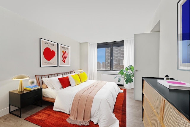 415 E 37th St Unit 31D, New York City, NY 10016 - bedroom with wood finished floors