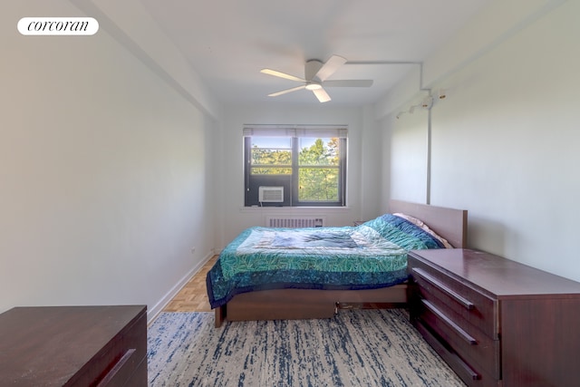 11 Riverside Dr Unit 4Kw, New York City, NY 10023 - bedroom with radiator heating unit, ceiling fan, and cooling unit