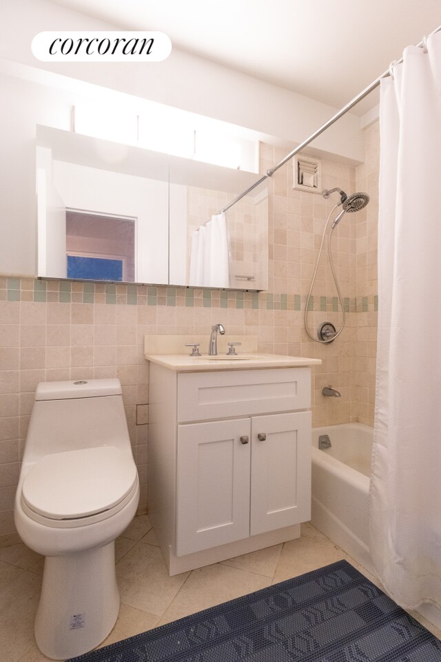 11 Riverside Dr Unit 4Kw, New York City, NY 10023 - full bathroom featuring tile patterned flooring, vanity, shower / tub combo, and toilet