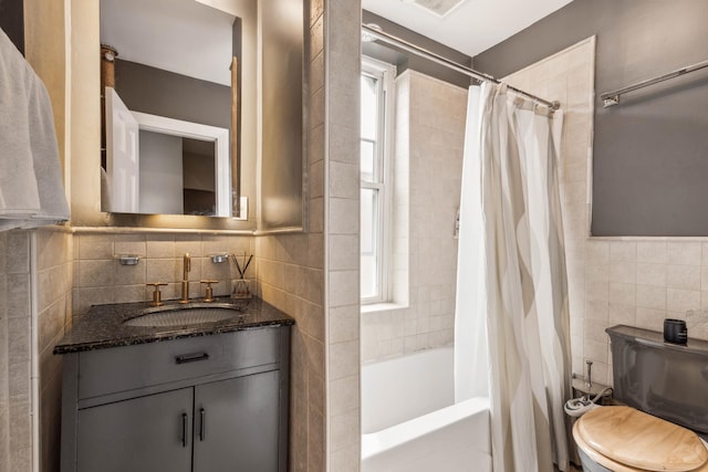 811 Walton Ave Unit F14, New York City, NY 10451 - bathroom featuring tile walls, shower / bath combo, toilet, vanity, and backsplash