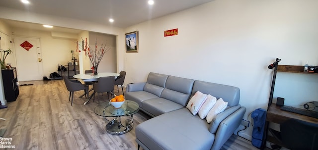 87-09 34th Ave Unit 3C, New York City, NY 11372 - living area with light wood-type flooring and recessed lighting