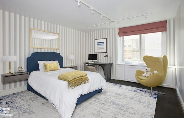 525 E 80th St Unit 7Bc, New York City, NY 10075 - bedroom with wallpapered walls and track lighting