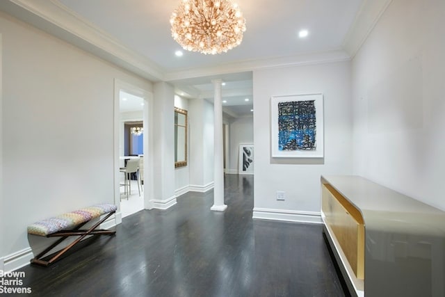 525 E 80th St Unit 7Bc, New York City, NY 10075 - hallway with wood finished floors, ornate columns, crown molding, a chandelier, and recessed lighting