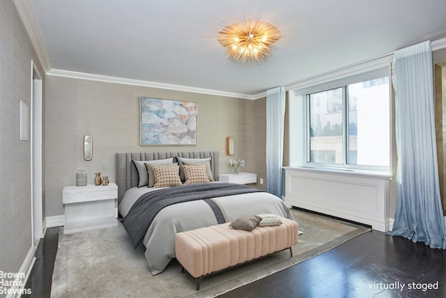 525 E 80th St Unit 7Bc, New York City, NY 10075 - bedroom with ornamental molding, wood finished floors, and baseboards
