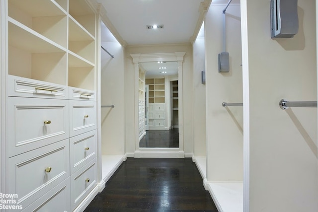 525 E 80th St Unit 7Bc, New York City, NY 10075 - corridor featuring dark wood-style flooring and baseboards