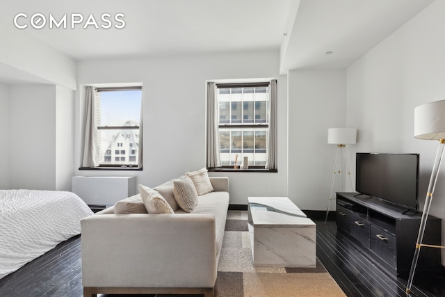 20 Pine St Unit 2905, New York City, NY 10005 - bedroom featuring wood finished floors and multiple windows