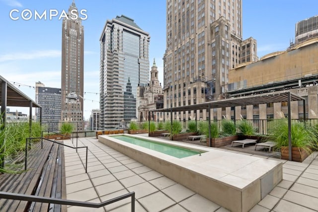 20 Pine St Unit 2905, New York City, NY 10005 - balcony with a skyline view, view of pool area, and cooling unit
