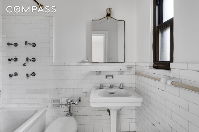 full bathroom featuring tile walls and toilet
