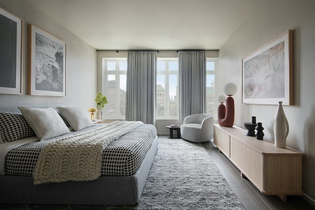 bedroom featuring dark wood finished floors