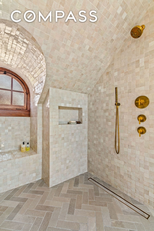1221 Albemarle Rd, New York City, NY 11218 - full bath with lofted ceiling, tile walls, and tiled shower