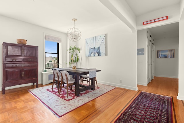 80 Winthrop St Unit 4C, New York City, NY 11225 - dining space with a chandelier and baseboards