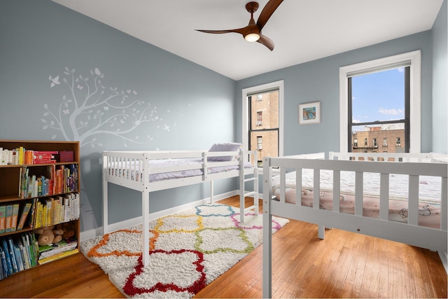 80 Winthrop St Unit 4C, New York City, NY 11225 - bedroom with wood finished floors, lofted ceiling, and baseboards