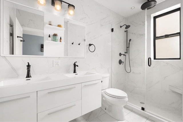 80 Winthrop St Unit 4C, New York City, NY 11225 - bathroom with a marble finish shower, marble finish floors, toilet, double vanity, and tile walls