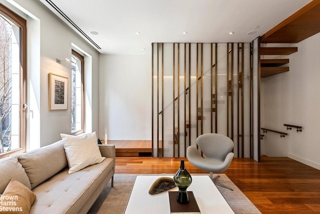 251 E 61st St, New York City, NY 10065 - living area featuring wood finished floors and recessed lighting