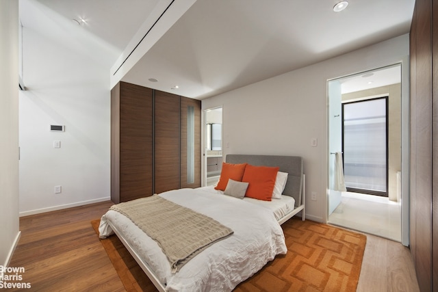 251 E 61st St, New York City, NY 10065 - bedroom featuring light wood-style flooring, a closet, baseboards, and recessed lighting