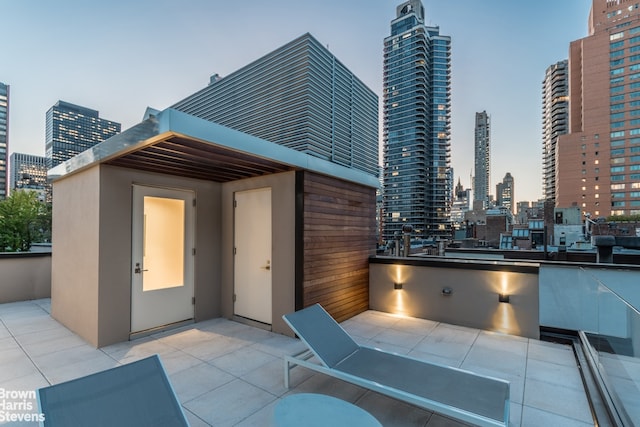 251 E 61st St, New York City, NY 10065 - view of patio featuring a skyline view