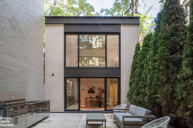 251 E 61st St, New York City, NY 10065 - rear view of property with brick siding, a patio, and an outdoor living space