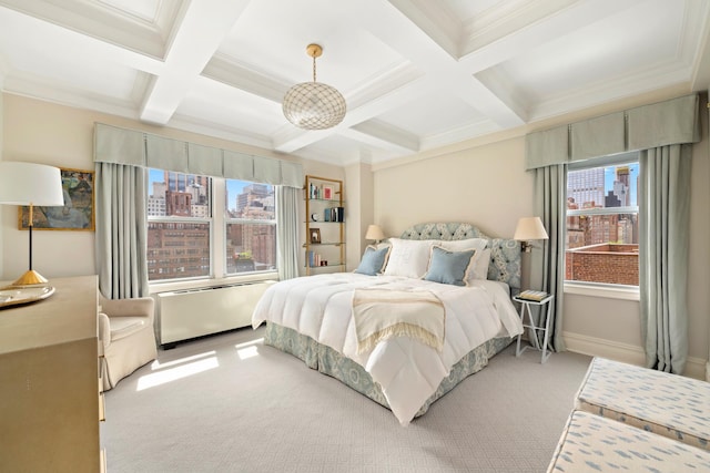 123 E 37th St Unit 11C, New York City, NY 10016 - bedroom featuring coffered ceiling, light carpet, beam ceiling, and ornamental molding