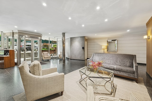 lobby featuring recessed lighting and crown molding