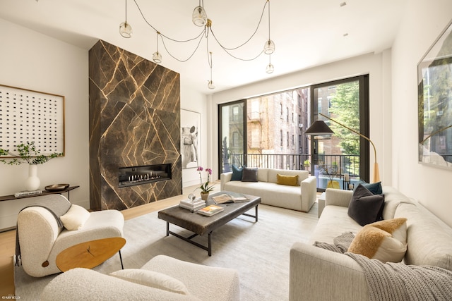 48 W 85th St, New York City, NY 10024 - living room featuring wood finished floors and a high end fireplace