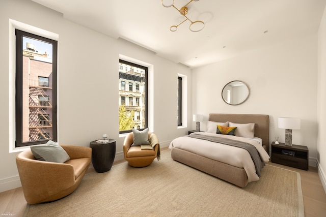 48 W 85th St, New York City, NY 10024 - bedroom featuring baseboards and wood finished floors