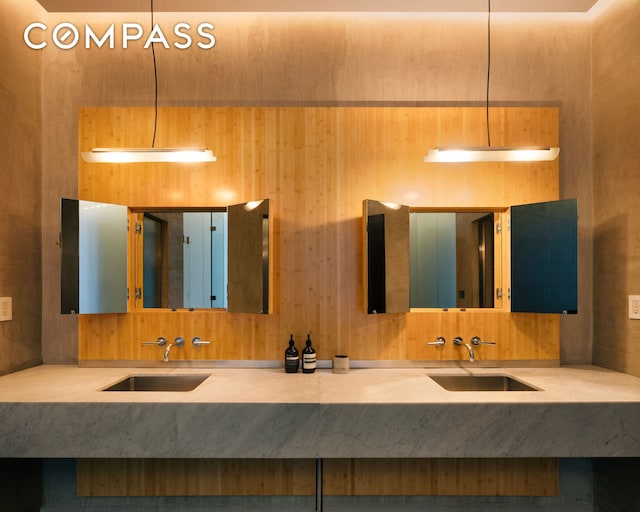 bathroom featuring double vanity