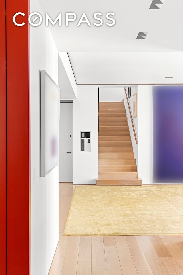 27 Wooster St Ph, Ph, New York City, NY 10013 - hallway with stairs and wood finished floors