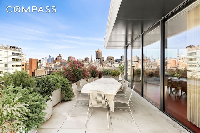 27 Wooster St Ph, Ph, New York City, NY 10013 - balcony with a skyline view and outdoor dining area