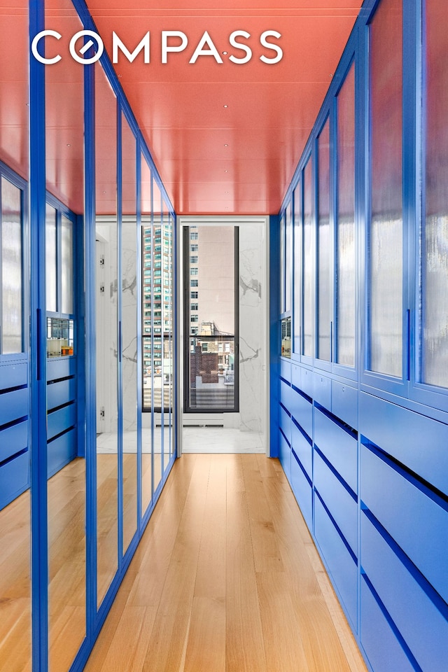 27 Wooster St Ph, Ph, New York City, NY 10013 - hallway with wood finished floors and floor to ceiling windows