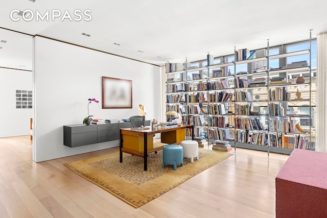 27 Wooster St Ph, Ph, New York City, NY 10013 - office featuring wood finished floors and a wall of windows
