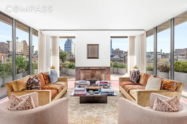 27 Wooster St Ph, Ph, New York City, NY 10013 - living area with a skyline view and expansive windows
