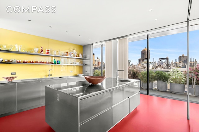 27 Wooster St Ph, Ph, New York City, NY 10013 - kitchen with stainless steel counters, a skyline view, open shelves, and floor to ceiling windows